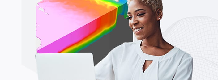 Young woman with white top using a laptop