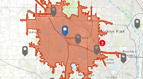 Map with one primary retail site indicated with a blue pin and many competitor sites indicated with gray pins. 